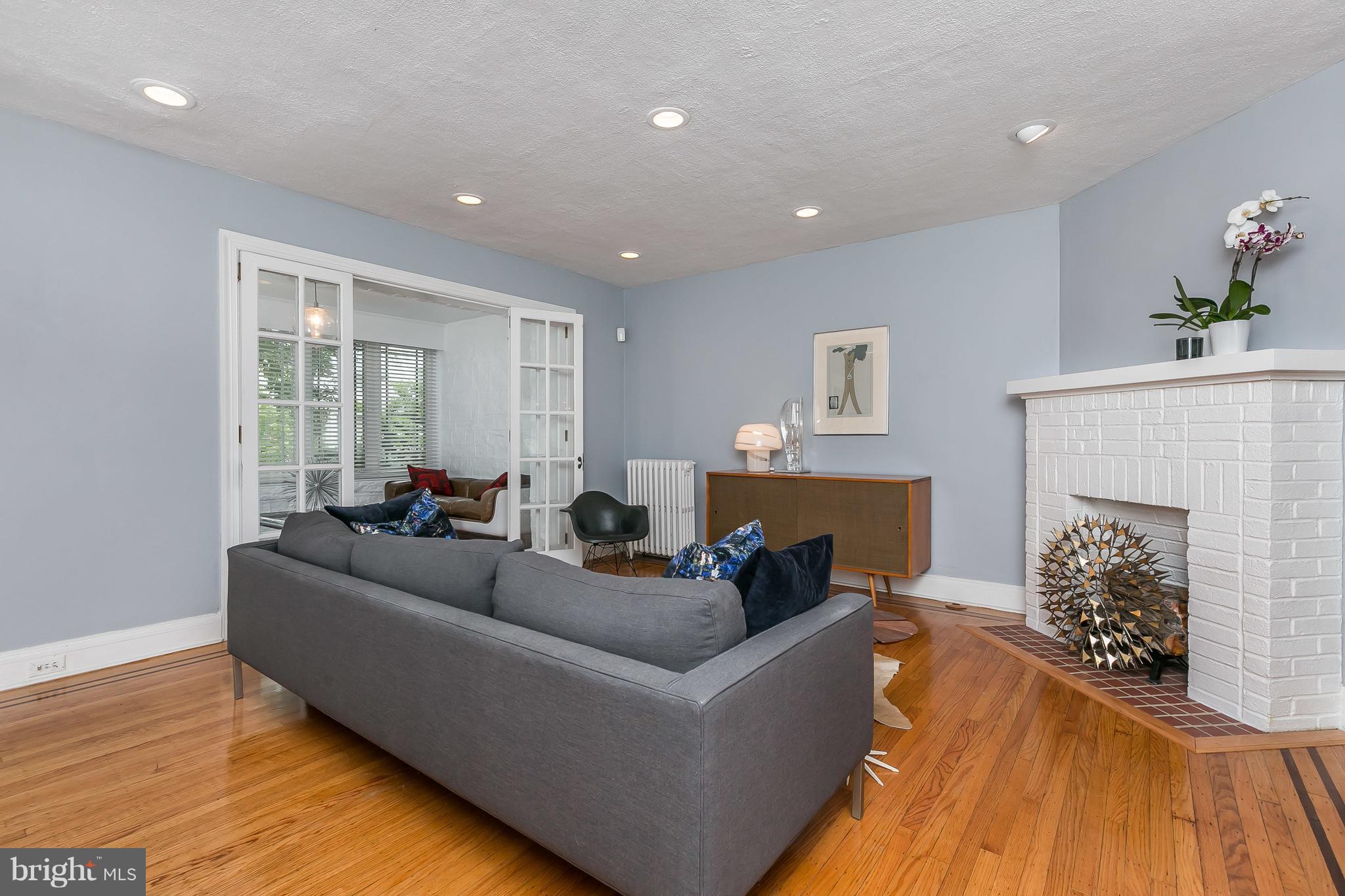 3622 Kimble Road Baltimore, MD 21218 - Photo 5 of 30 a living room with furniture and a fireplace
