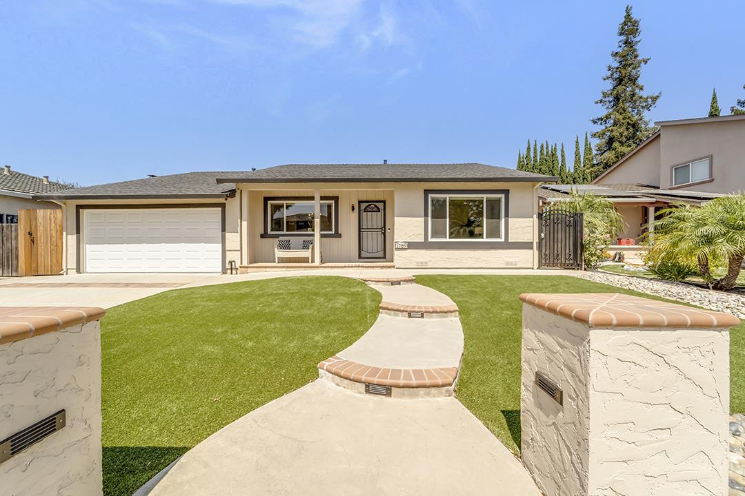 a house view with a garden space