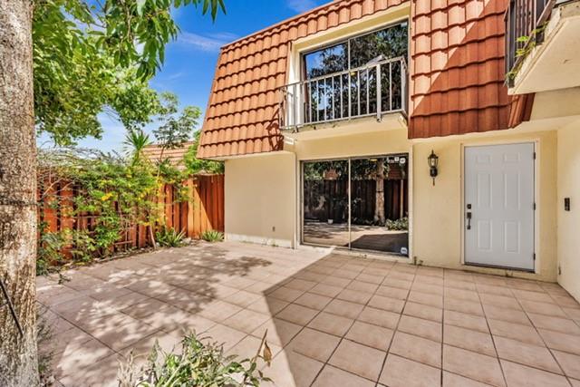 3305 Spanish Wells Drive, Unit 41B Delray Beach, FL 33445 - Photo 4 of 13 a view of a building with entryway