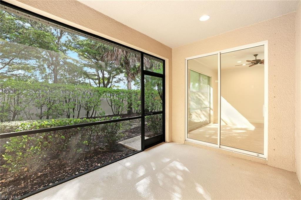 13366 Kent Street Naples, FL 34109 - Photo 18 of 23 View of unfurnished sunroom