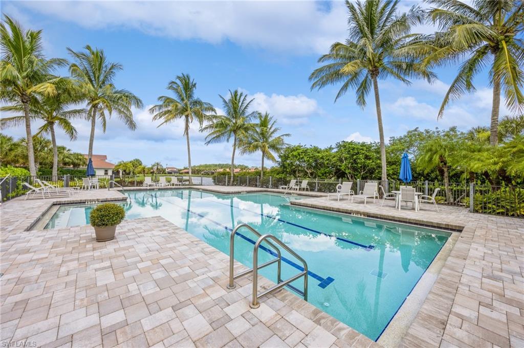 13366 Kent Street Naples, FL 34109 - Photo 23 of 23 Community pool with a patio