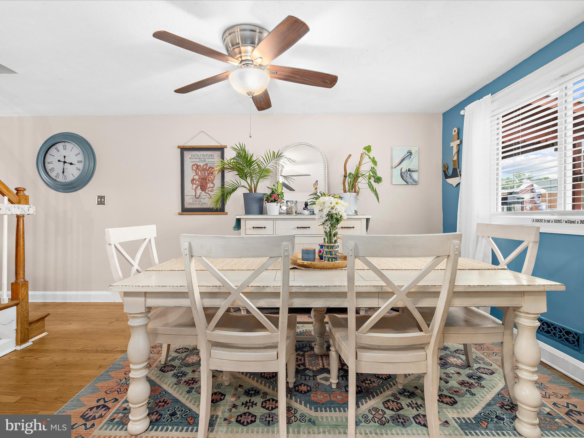 7851 Kentley Road Baltimore, MD 21222 - Photo 11 of 58 a view of a dining room with furniture and a large window