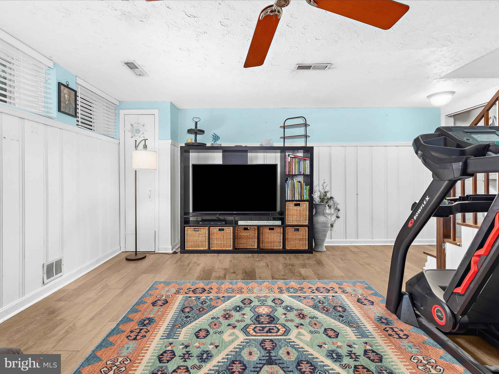7851 Kentley Road Baltimore, MD 21222 - Photo 17 of 58 a bedroom with furniture and a flat screen tv