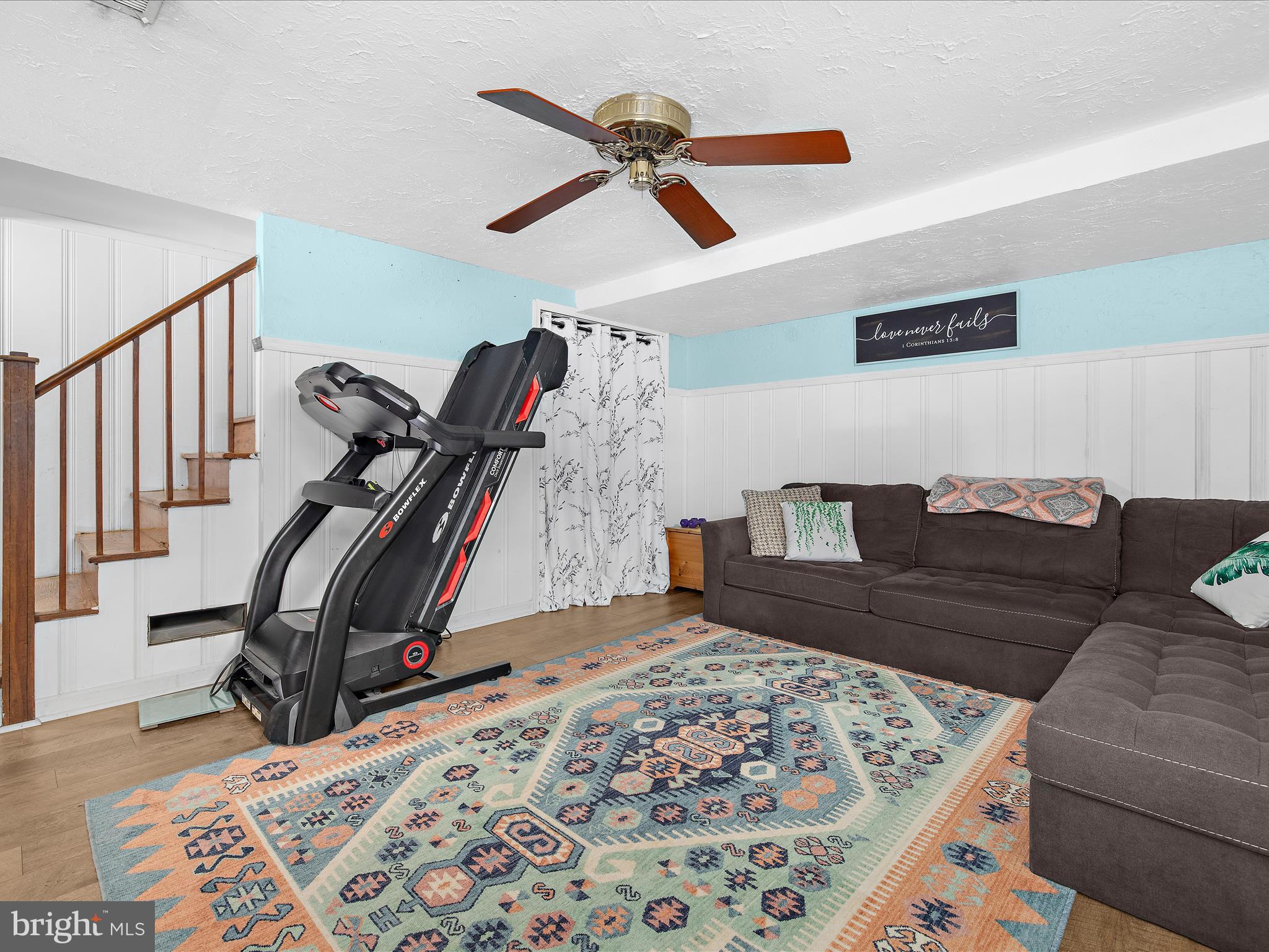 7851 Kentley Road Baltimore, MD 21222 - Photo 19 of 58 a bed room with a bed and a couch