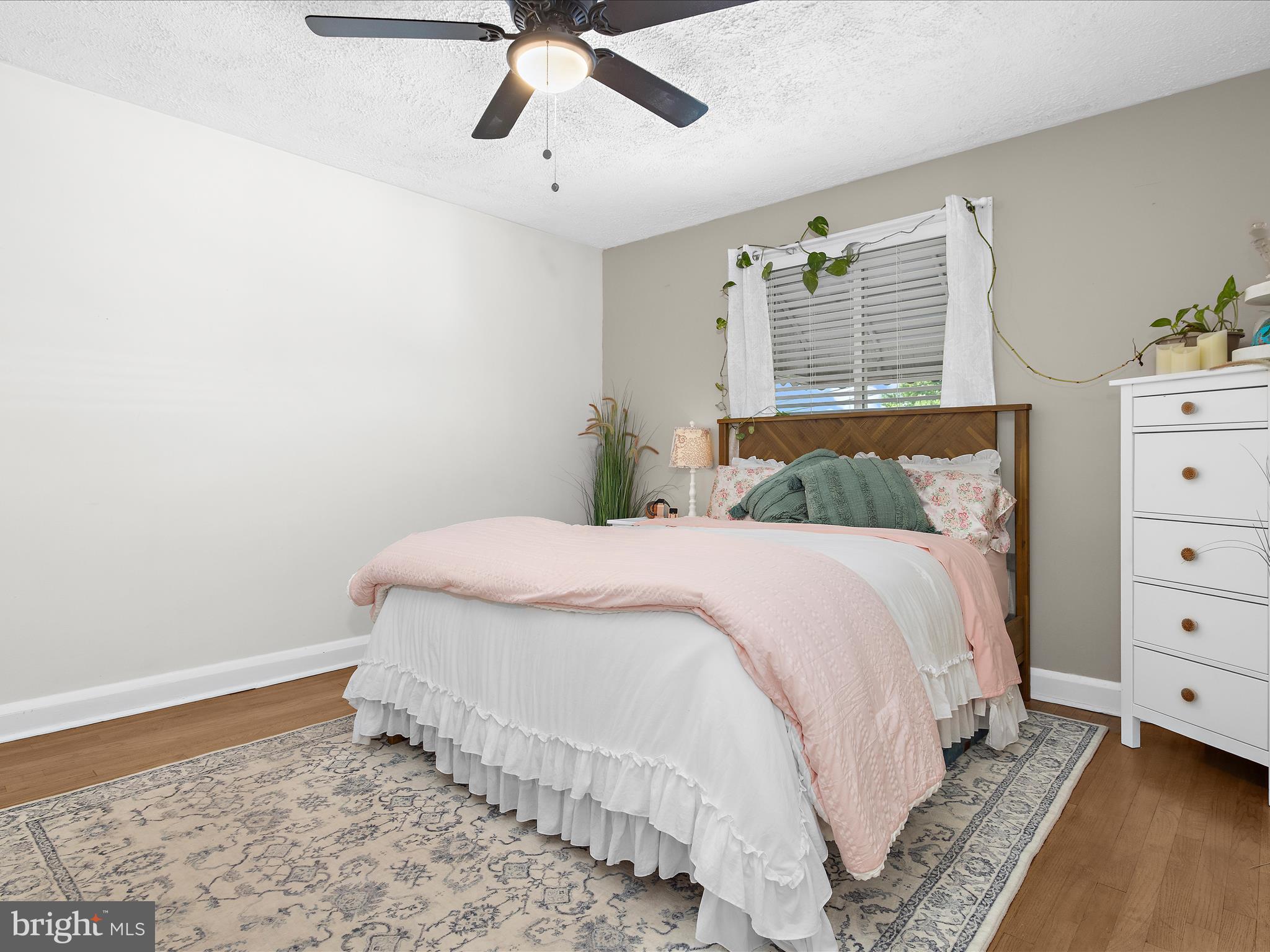 7851 Kentley Road Baltimore, MD 21222 - Photo 24 of 58 a bedroom with a bed and a window