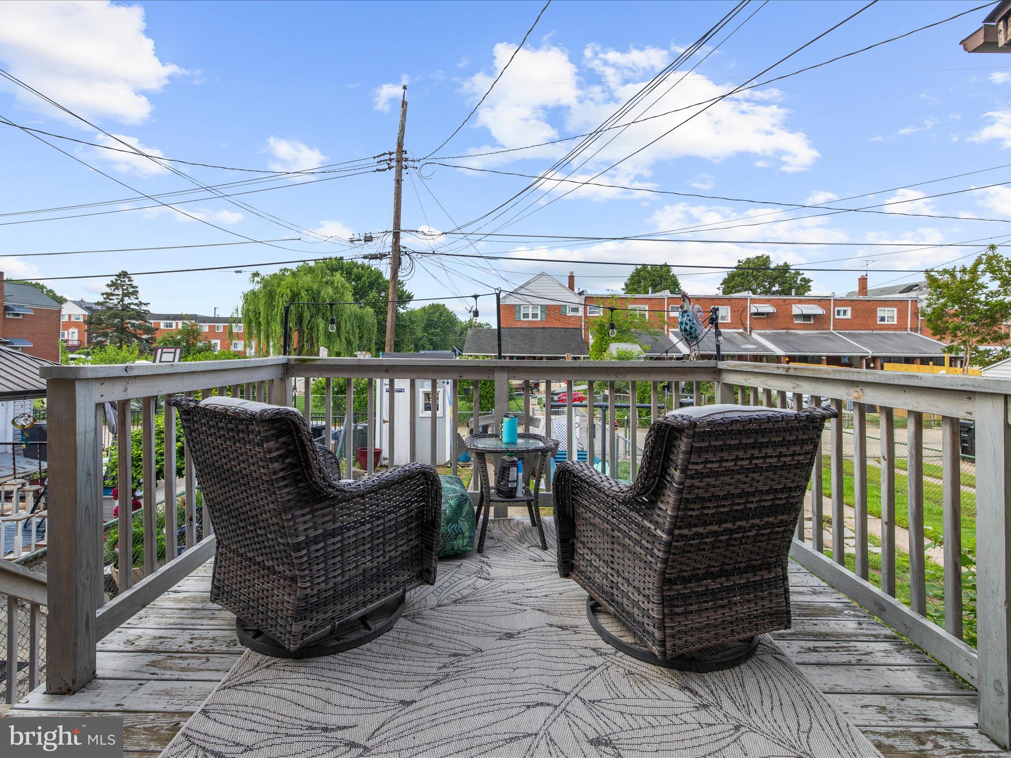 7851 Kentley Road Baltimore, MD 21222 - Photo 46 of 58 a balcony with furniture and outdoor view