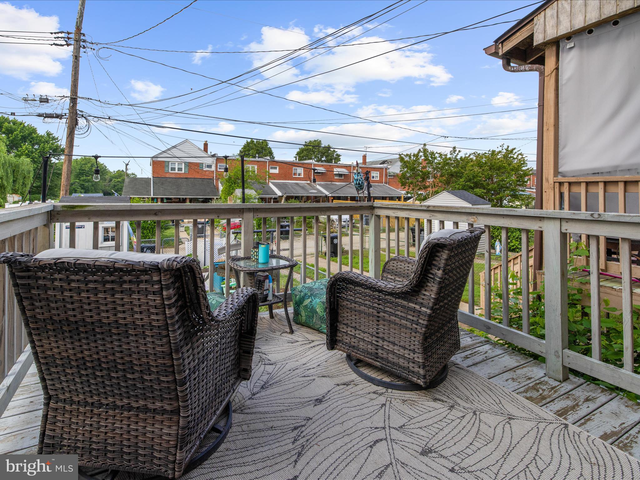 7851 Kentley Road Baltimore, MD 21222 - Photo 47 of 58 a view of a chairs in the balcony