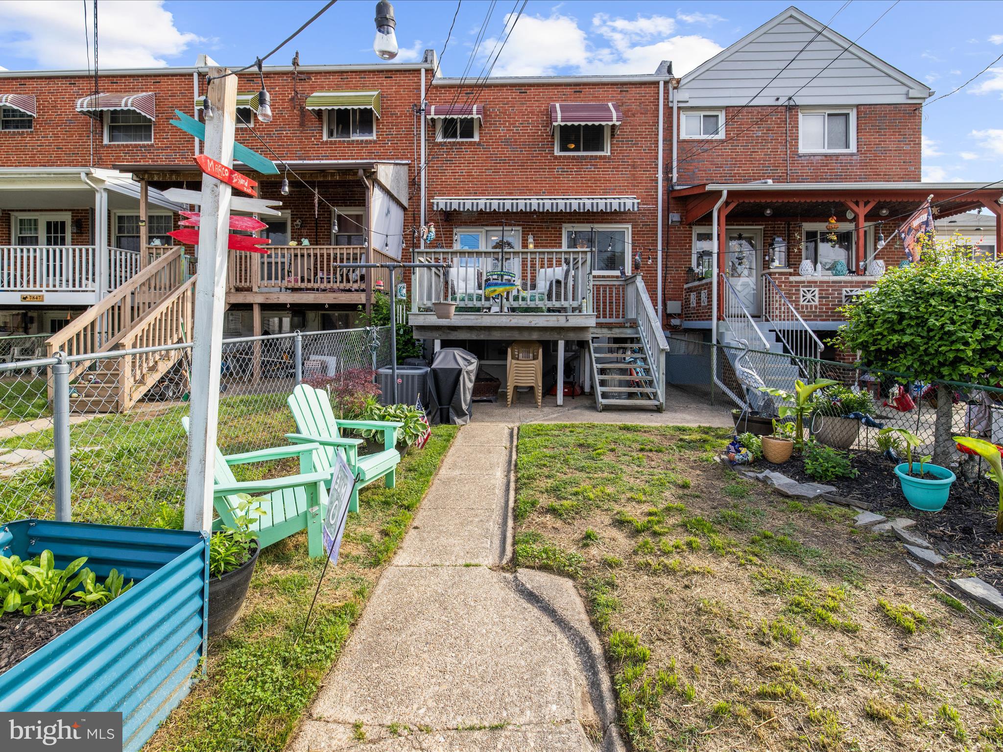 7851 Kentley Road Baltimore, MD 21222 - Photo 51 of 58 a front view of a house with a yard