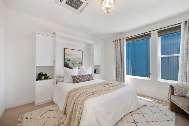 a street view with tall buildings