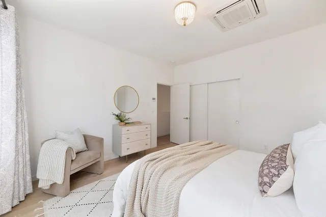 a city street filled with lots of traffic and parking