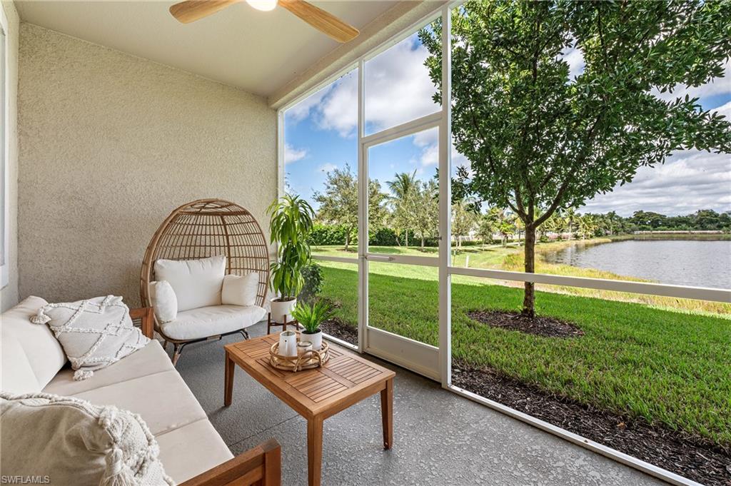 4638 Arboretum Circle, Unit 102 Naples, FL 34112 - Photo 10 of 20 a view of a couches in patio of back yard