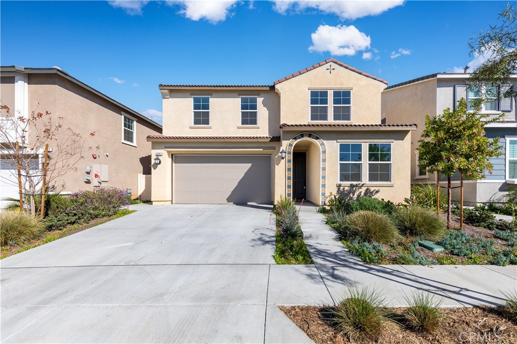 3661 Bonellia Street Riverside, CA 92503 - Photo 1 of 1 a front view of a house with a yard