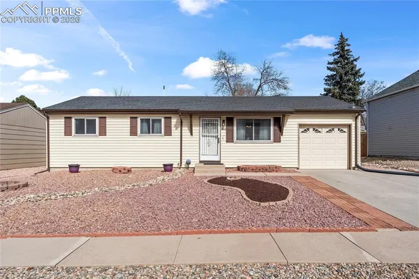 a front view of a house with yard