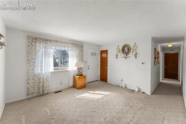 an empty room with windows