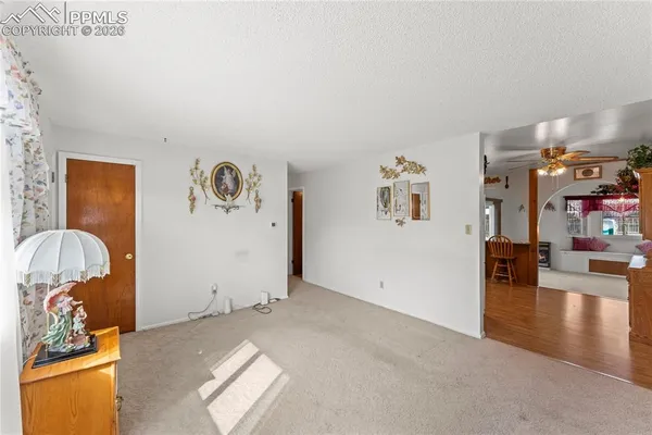 a view of a livingroom with furniture and a couch