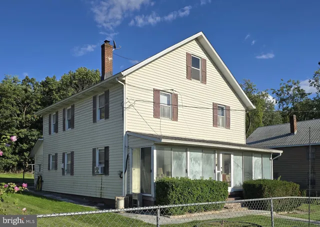a front view of a house with a porch