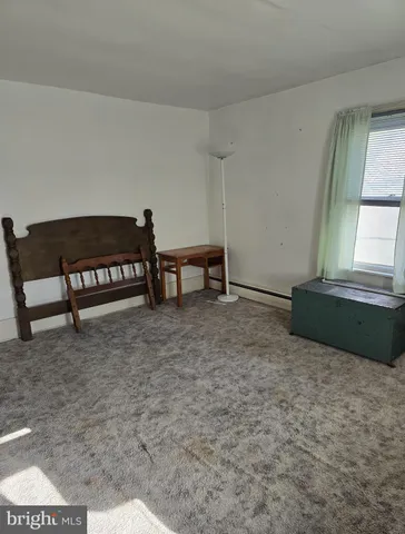 a view of a livingroom with furniture