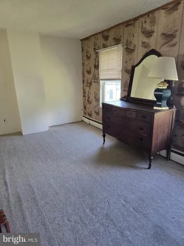 a room with furniture and a window