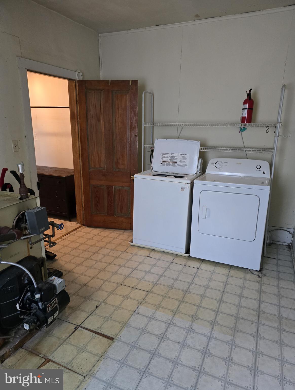115 South Lightner Street Union Bridge, MD 21791 - Photo 7 of 19 a room with a washing machine and a sink