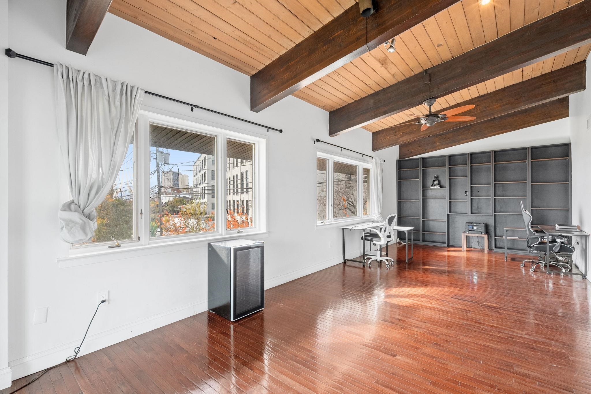 76 Hackensack Plank Road Weehawken, NJ 07086 - Photo 23 of 44 a view of a dining room with furniture window and wooden floor