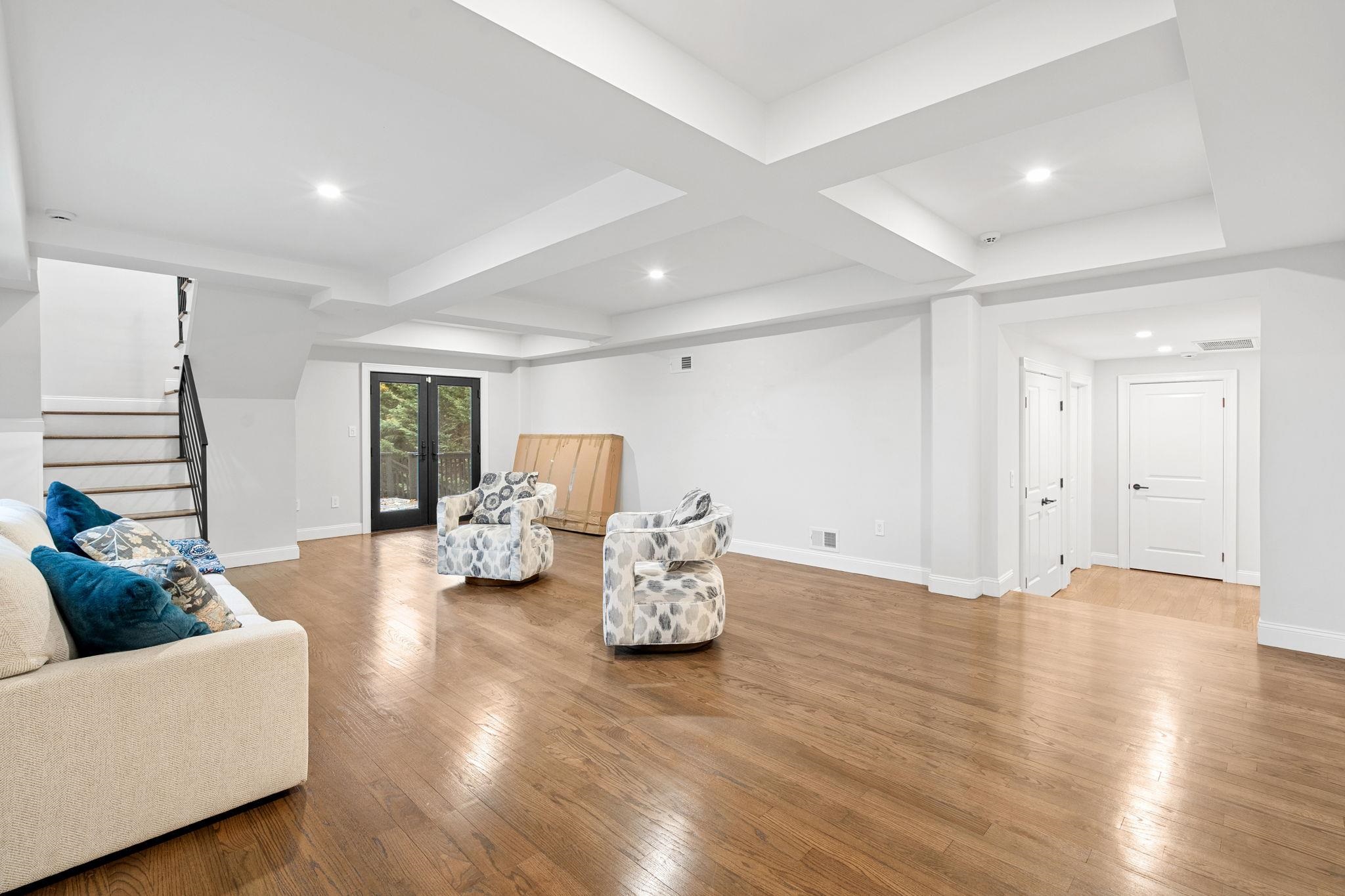 76 Hackensack Plank Road Weehawken, NJ 07086 - Photo 32 of 44 a living room with furniture and wooden floor