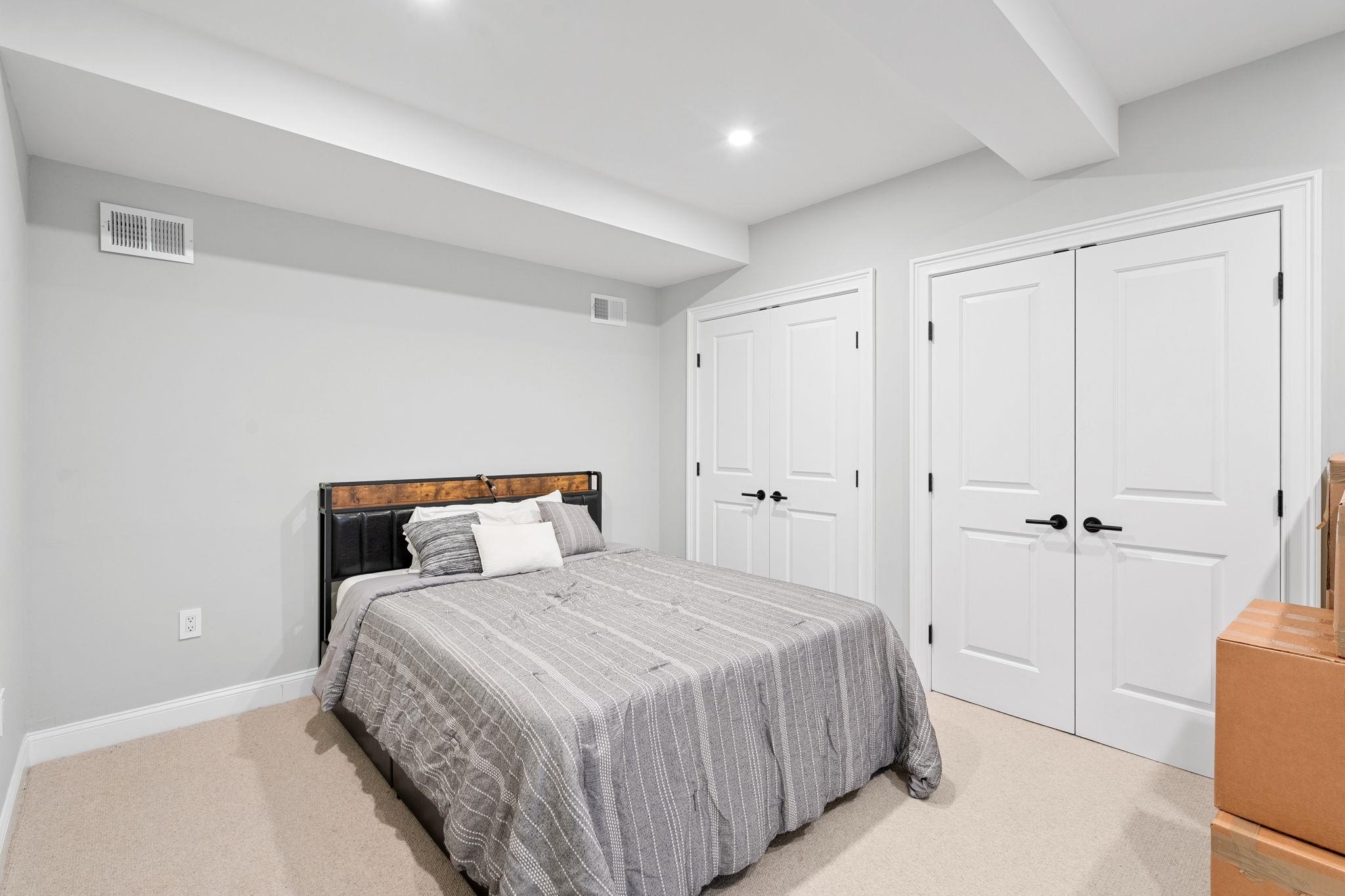 76 Hackensack Plank Road Weehawken, NJ 07086 - Photo 34 of 44 a bedroom with a bed and a closet