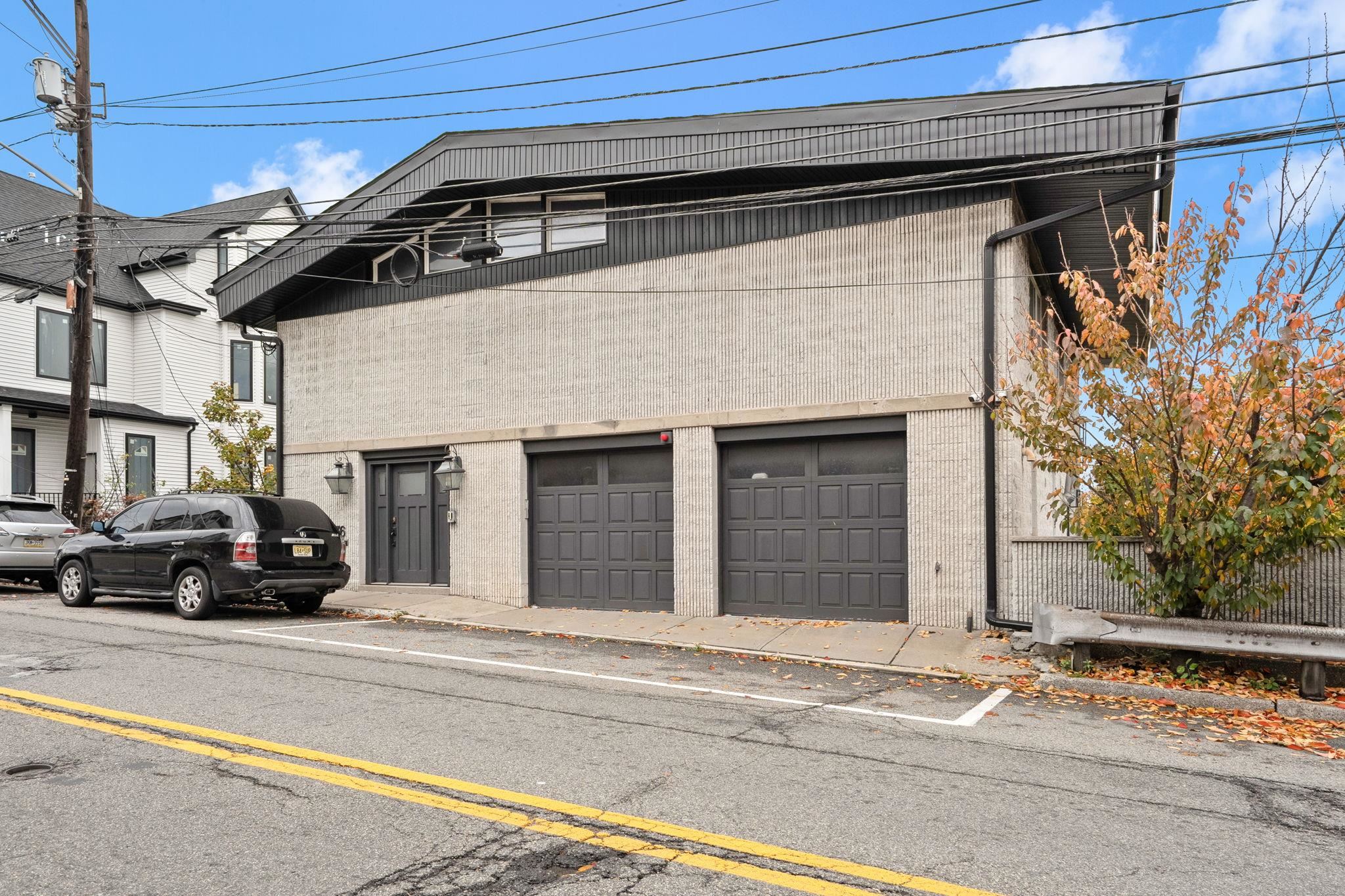 76 Hackensack Plank Road Weehawken, NJ 07086 - Photo 43 of 44 a view of street with large building