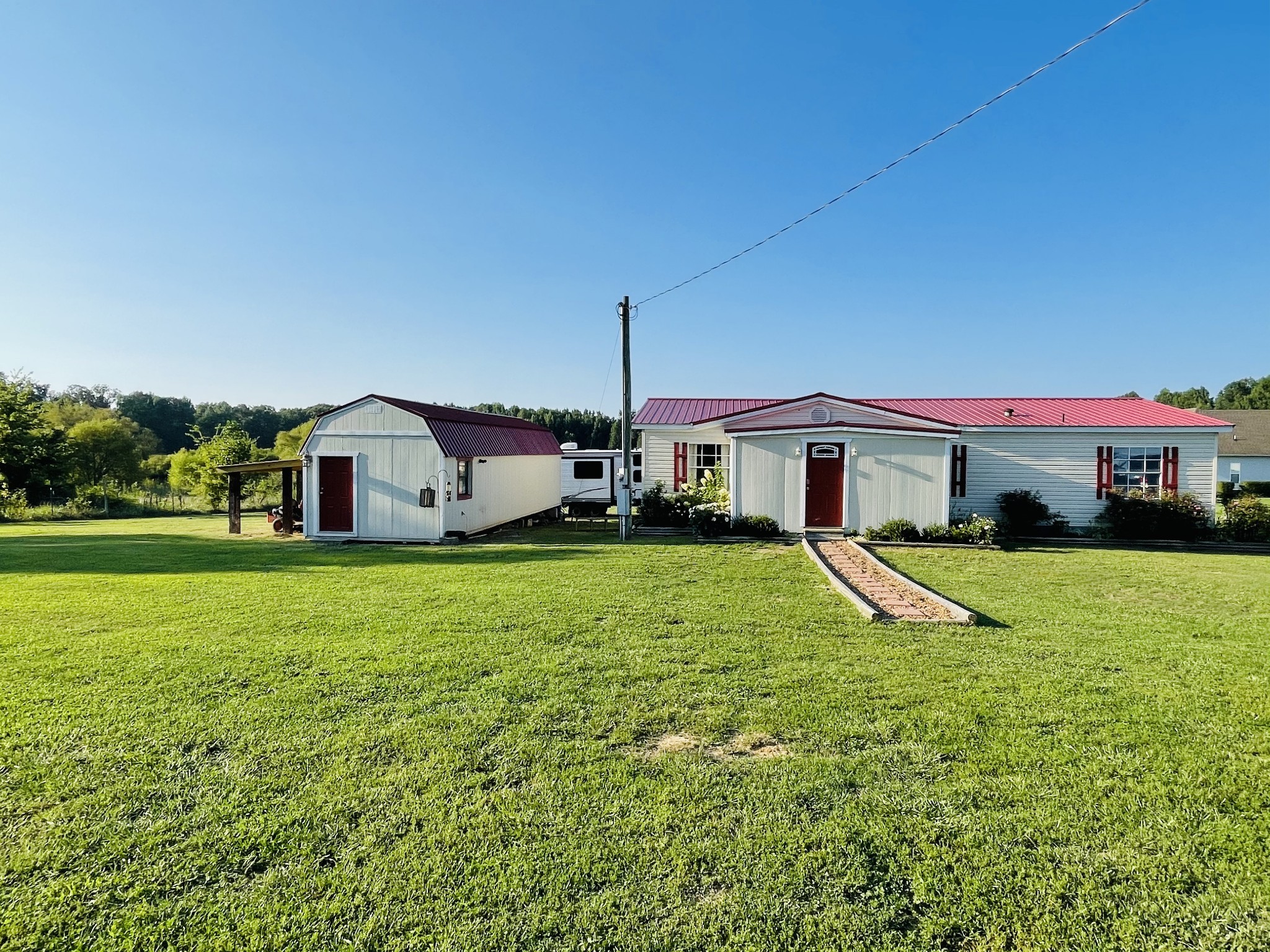 2015 Pomroy Road Manchester, TN 37355 - Photo 41 of 47 a front view of house with yard and seating area