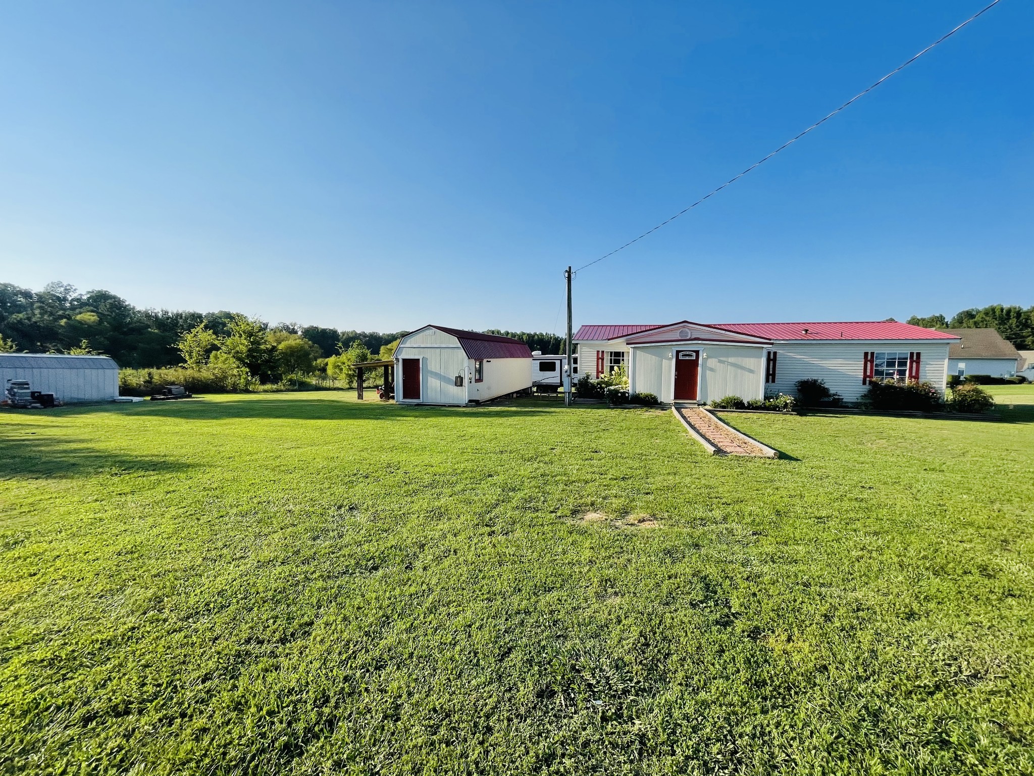 2015 Pomroy Road Manchester, TN 37355 - Photo 42 of 47 a view of yard with swimming pool and green space