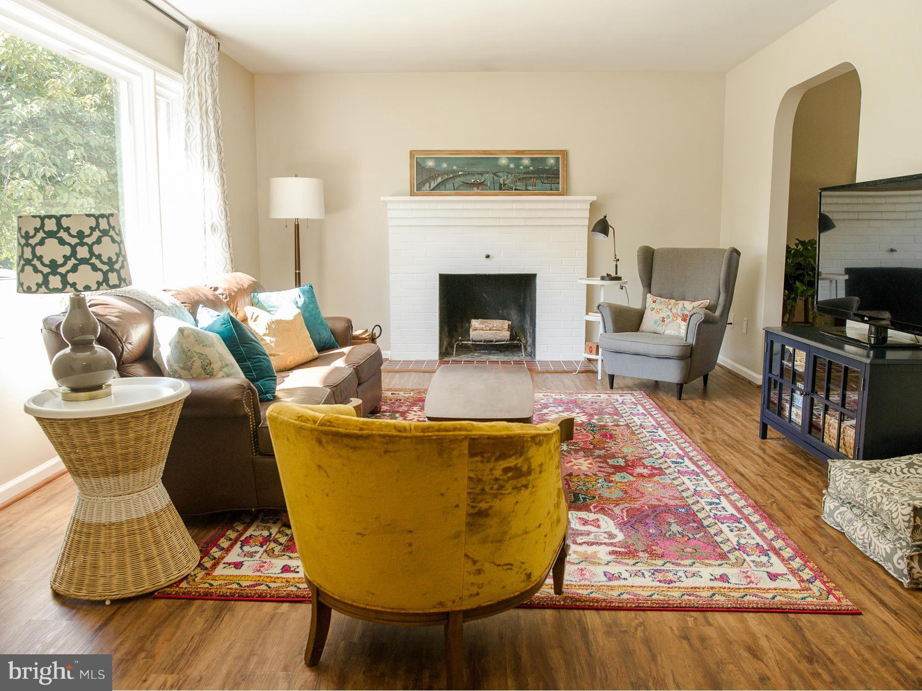 6788 Sunnybrook Drive Frederick, MD 21702 - Photo 9 of 29 Formal Living Room With Brick Fireplace