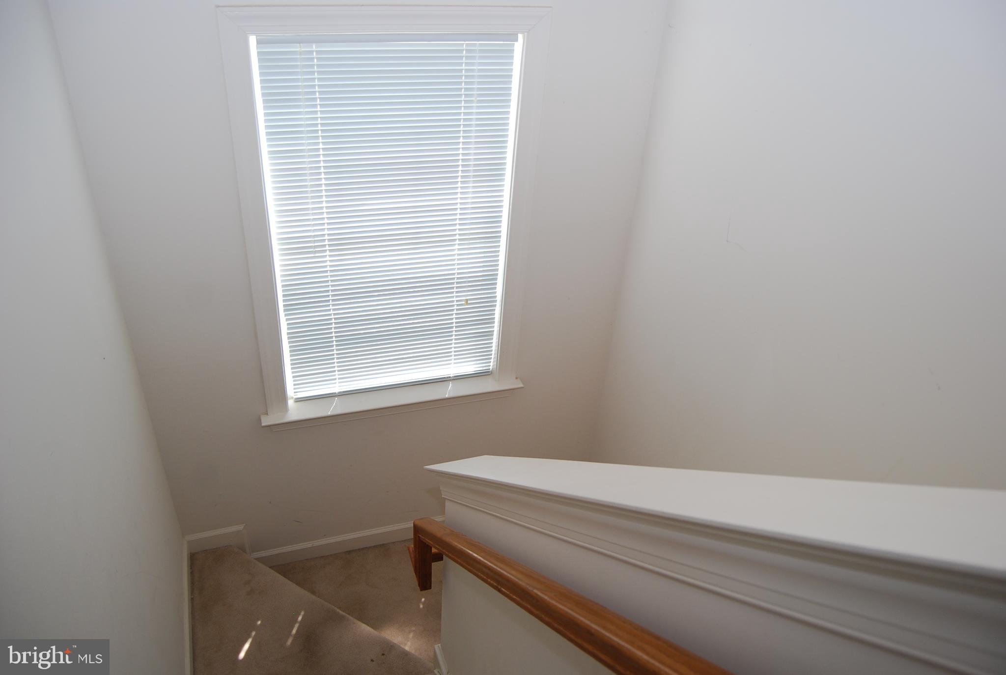 8101 Hard Shale Road Manassas, VA 20111 - Photo 21 of 30 Stairs with Window - End Unit Home