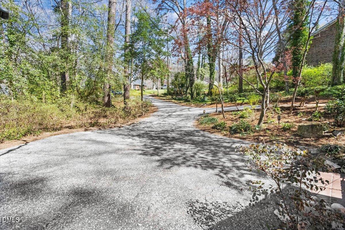 4805 Rembert Drive Raleigh, NC 27612 - Photo 37 of 45 a view of outdoor space with trees
