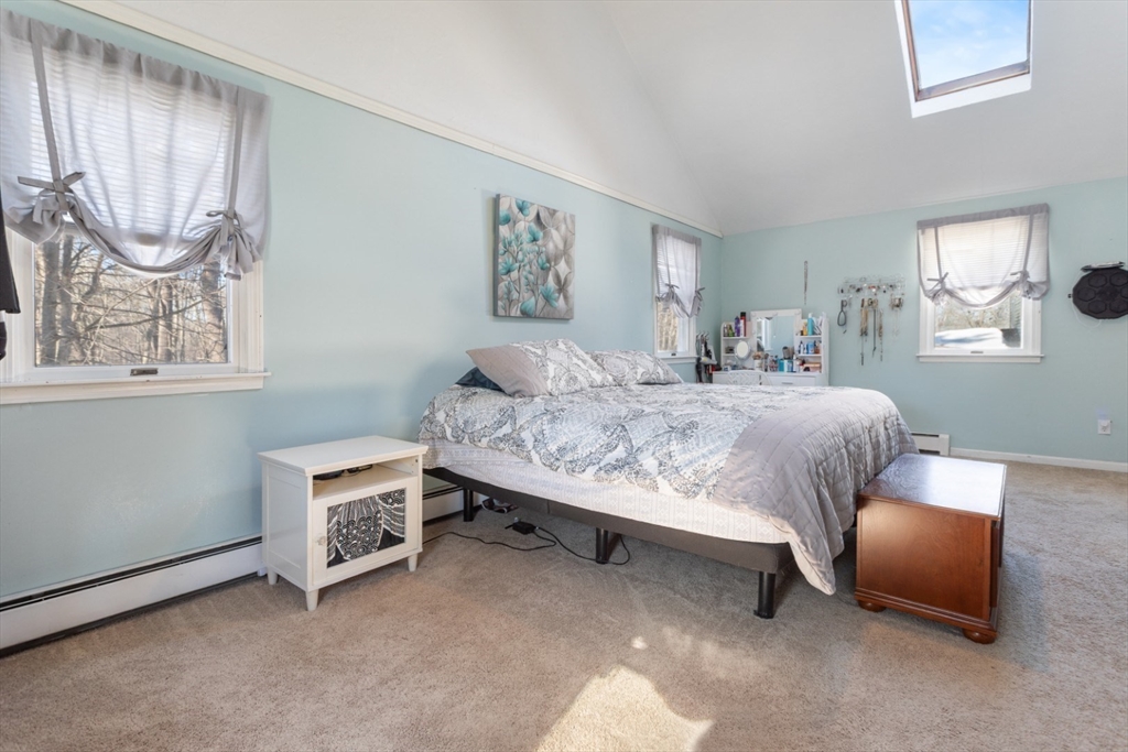 53 Rabbit Road Salisbury, MA 01952 - Photo 20 of 41 a bedroom with furniture and a window