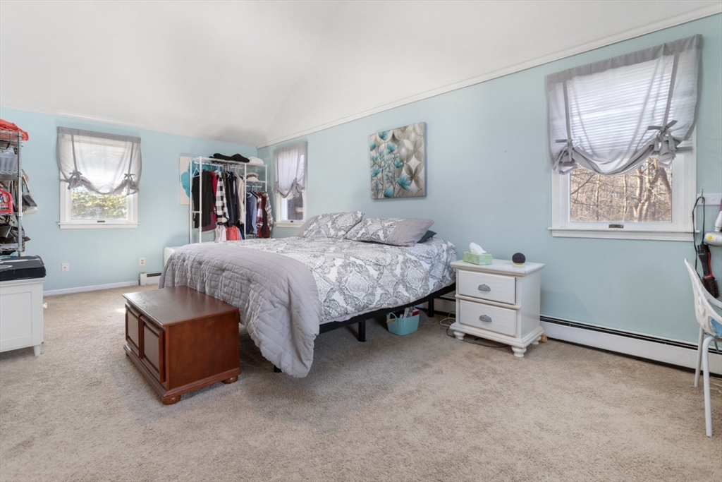 53 Rabbit Road Salisbury, MA 01952 - Photo 21 of 42 a bedroom with a bed and a window