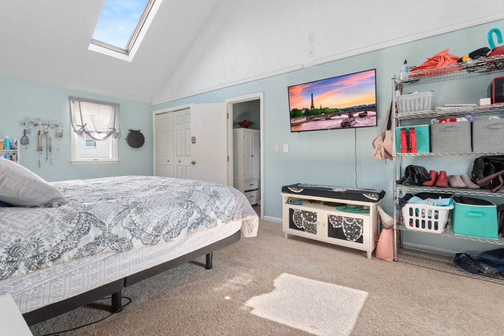 53 Rabbit Road Salisbury, MA 01952 - Photo 21 of 41 a bedroom with a bed and a dresser