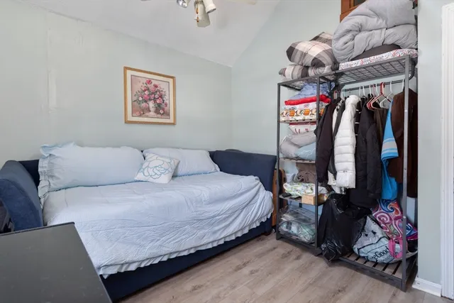 a bed room with a bed and a couch