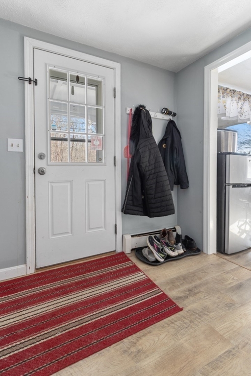 53 Rabbit Road Salisbury, MA 01952 - Photo 6 of 41 a bedroom with a bed and a window
