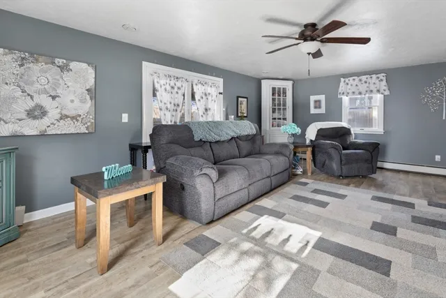 a living room with furniture and a window