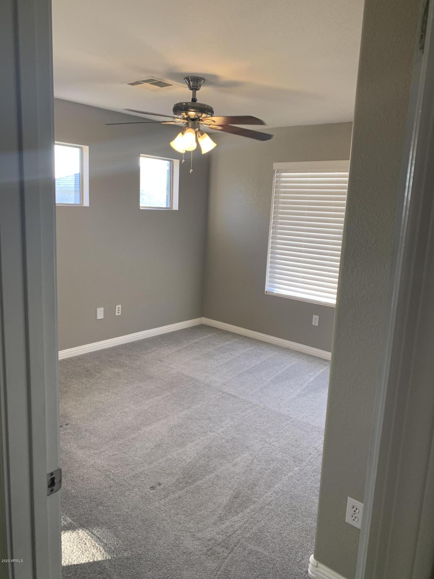 21842 North 40th Place Phoenix, AZ 85050 - Photo 13 of 42 a view of an empty room with a window