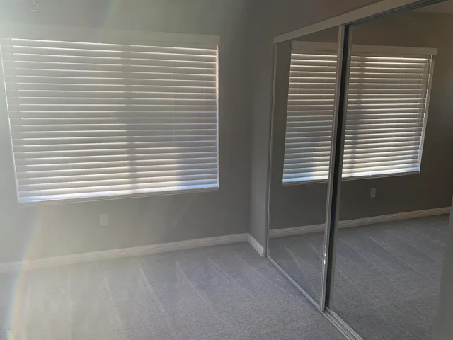 a view of a room that has a window in it