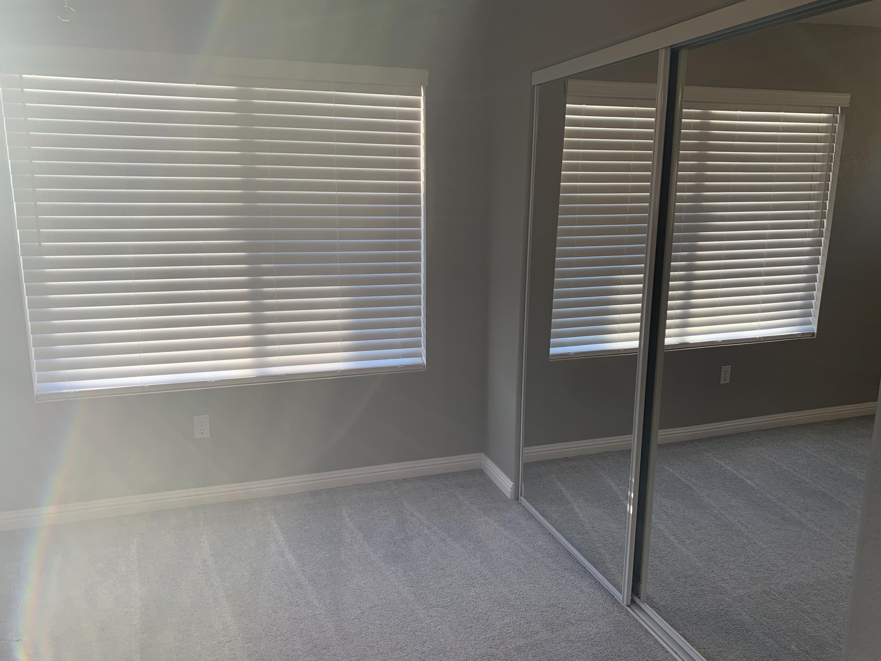 21842 North 40th Place Phoenix, AZ 85050 - Photo 14 of 42 a view of a room that has a window in it