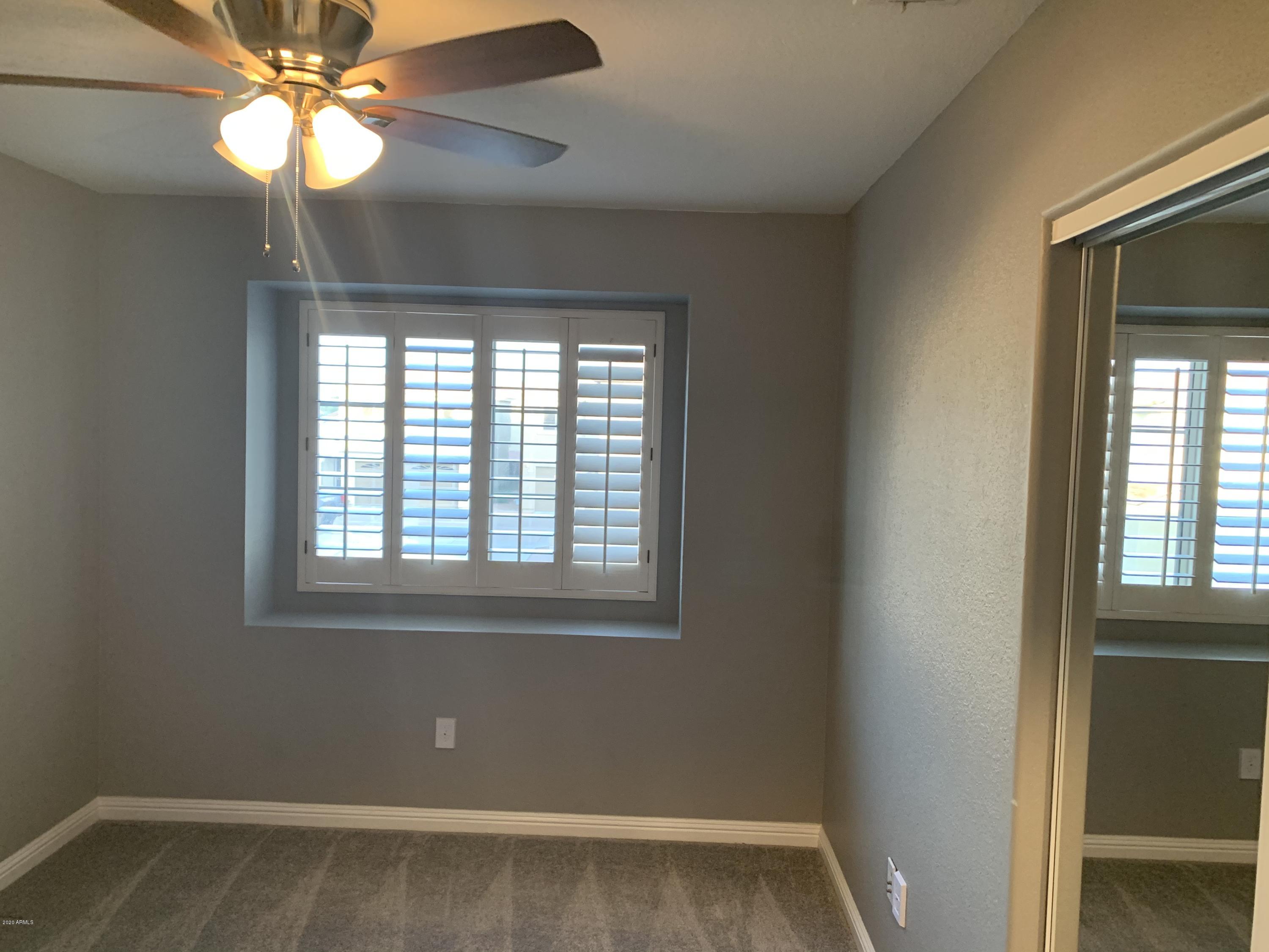 21842 North 40th Place Phoenix, AZ 85050 - Photo 20 of 42 a view of an empty room with a window
