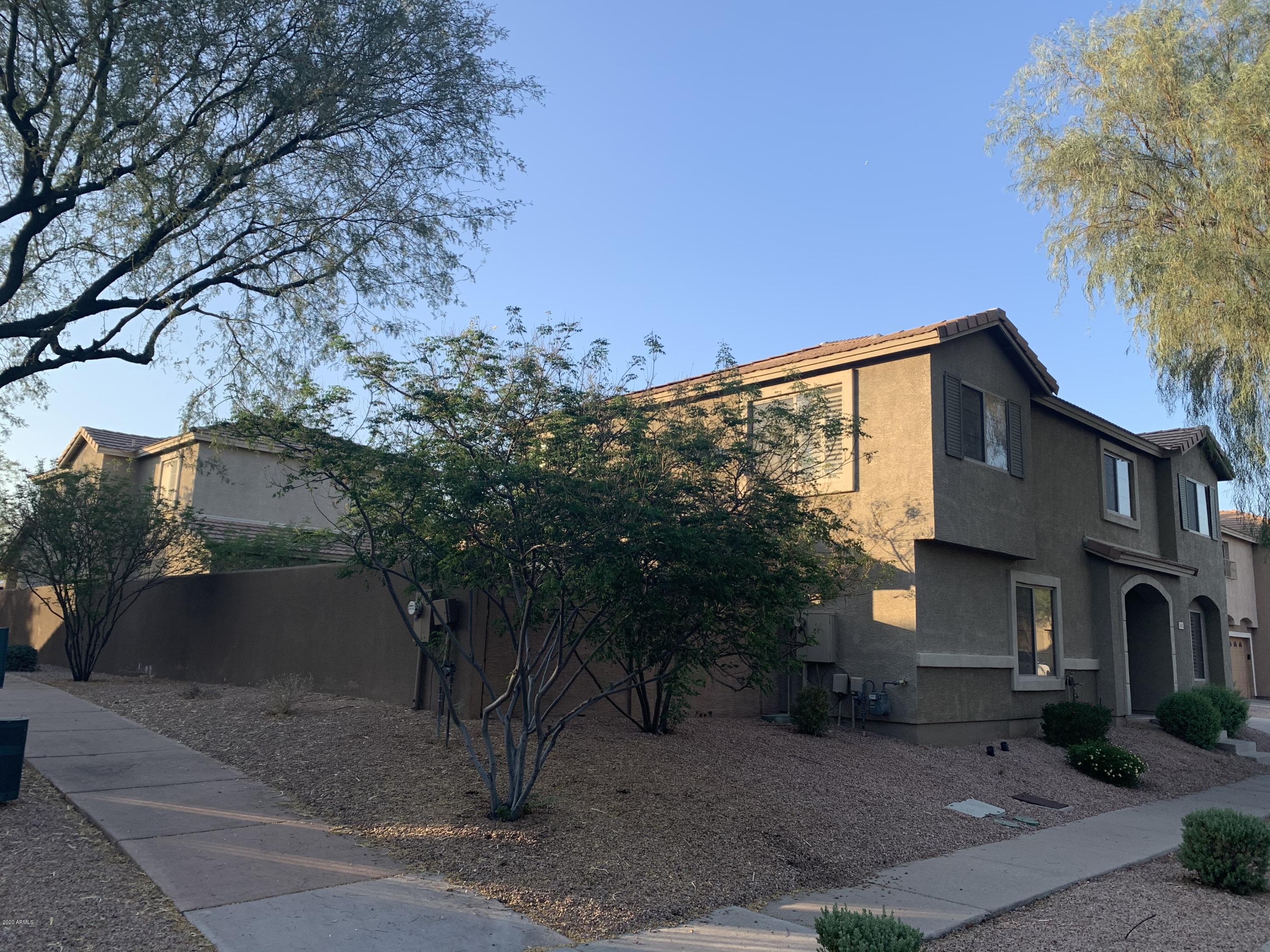 21842 North 40th Place Phoenix, AZ 85050 - Photo 2 of 42 a view of a house with a tree