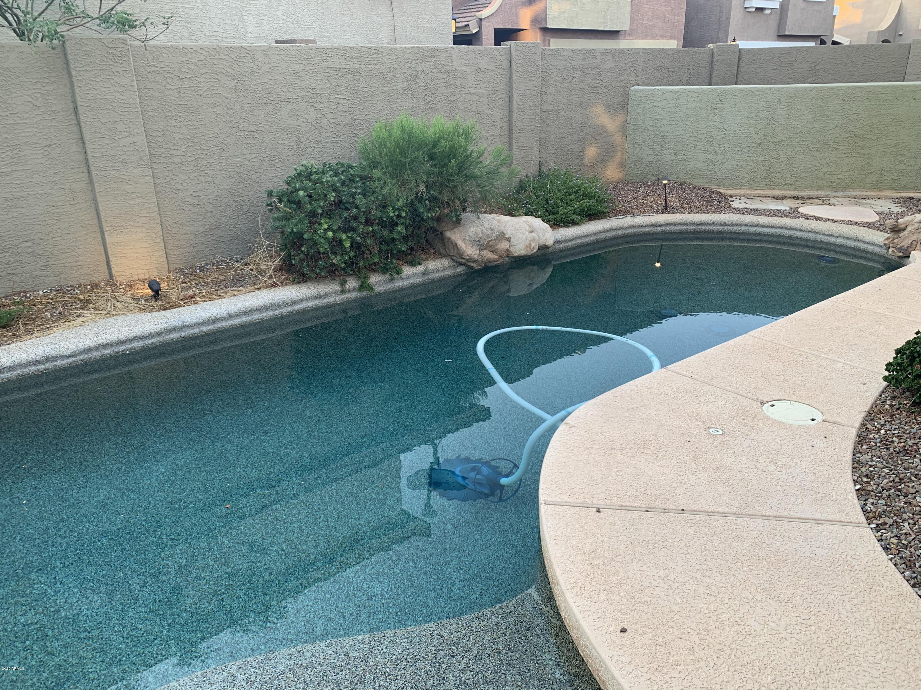 21842 North 40th Place Phoenix, AZ 85050 - Photo 34 of 42 an aerial view of a house with a yard