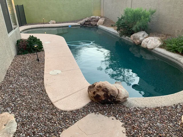 a view of a wooden floor and a lake view