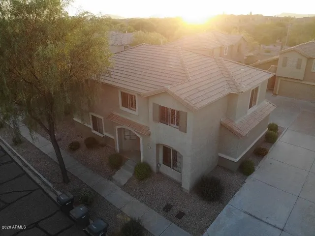 a view of a house with a roof deck