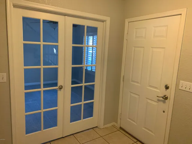 a view of closet area with empty racks