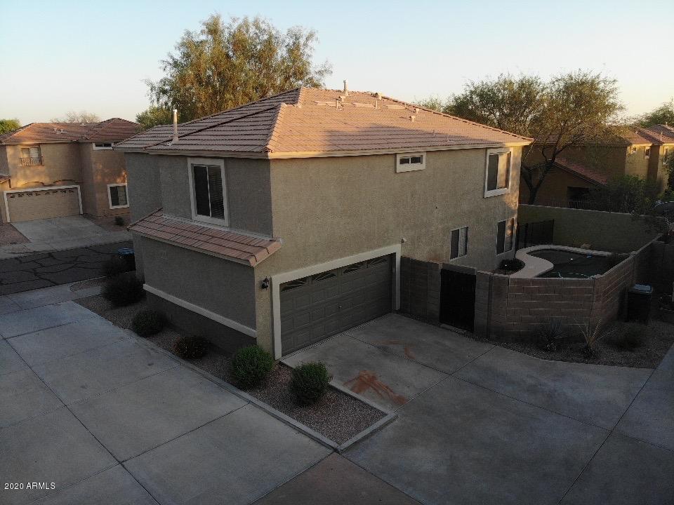 21842 North 40th Place Phoenix, AZ 85050 - Photo 42 of 42 a view of a patio with table and chairs