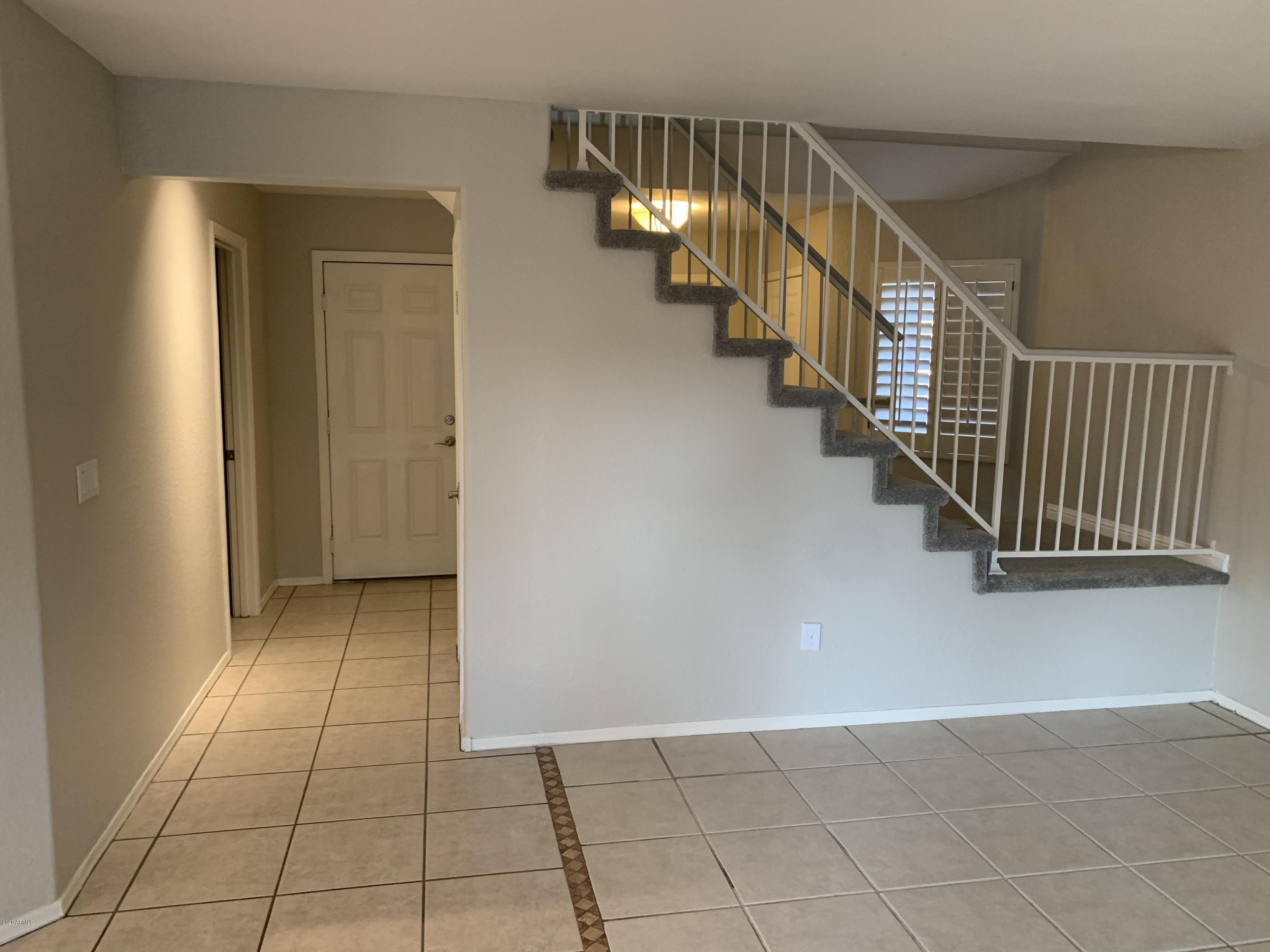 21842 North 40th Place Phoenix, AZ 85050 - Photo 6 of 42 a view of an entryway and stairs
