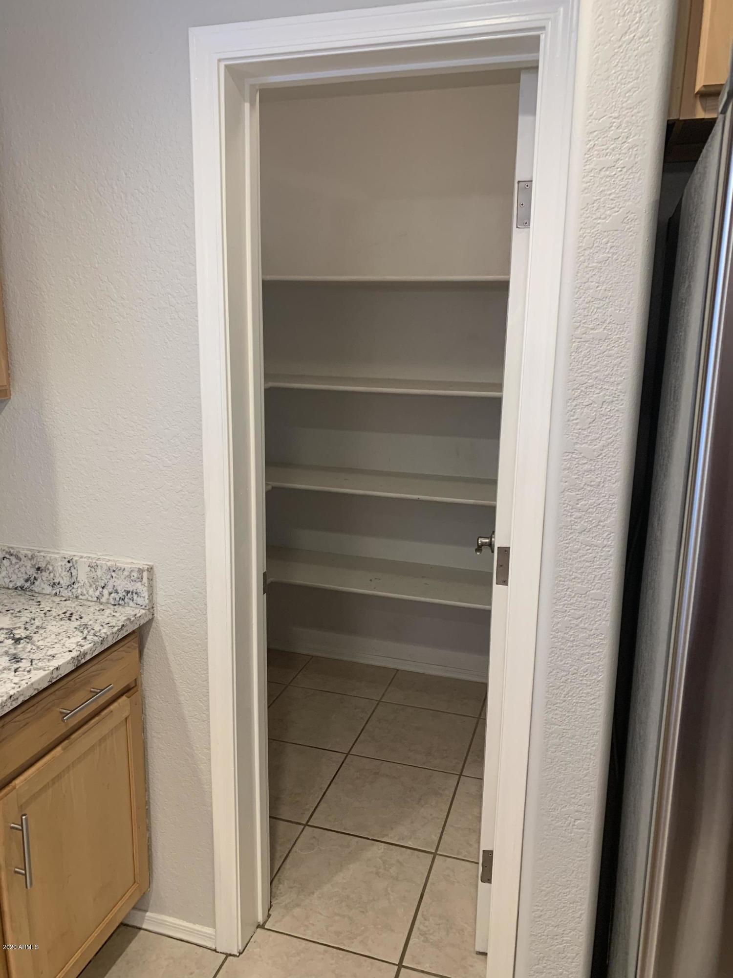 21842 North 40th Place Phoenix, AZ 85050 - Photo 8 of 42 a utility room with washer and dryer